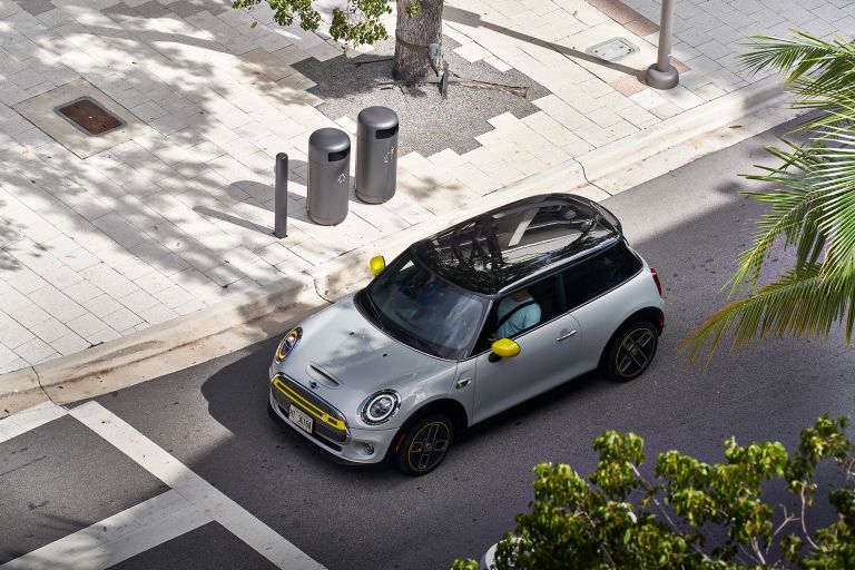 The MINI electric on a quiet street in a city