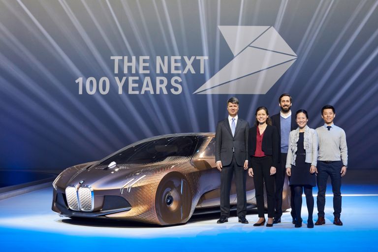 Harald Krüger and four young BMW Group employees at the centenary event of the BMW Group jubilee THE NEXT 100 YEARS.