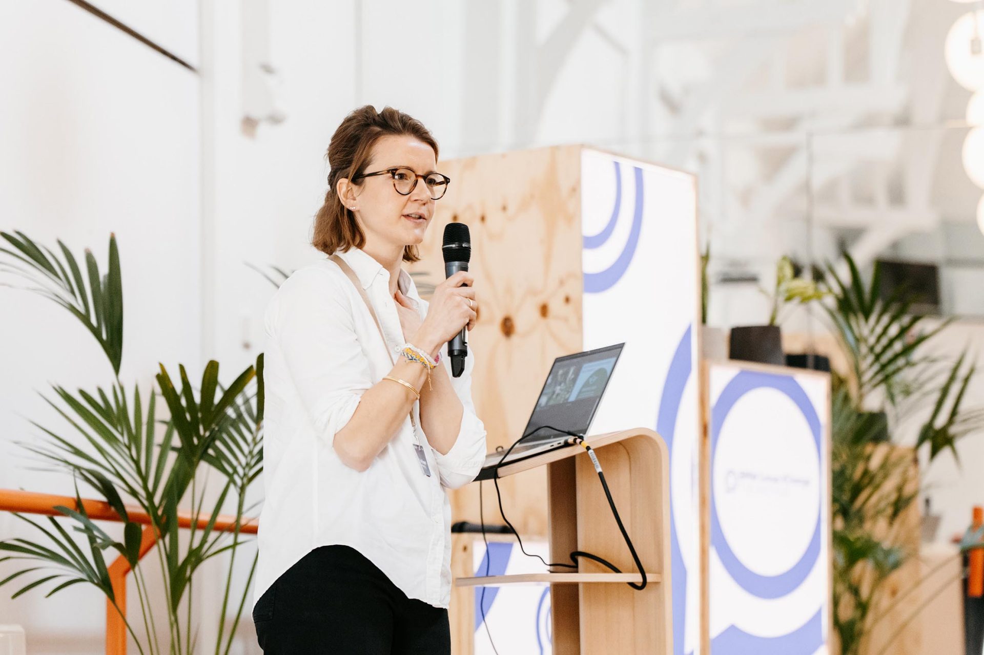  A woman giving a presentation on stage