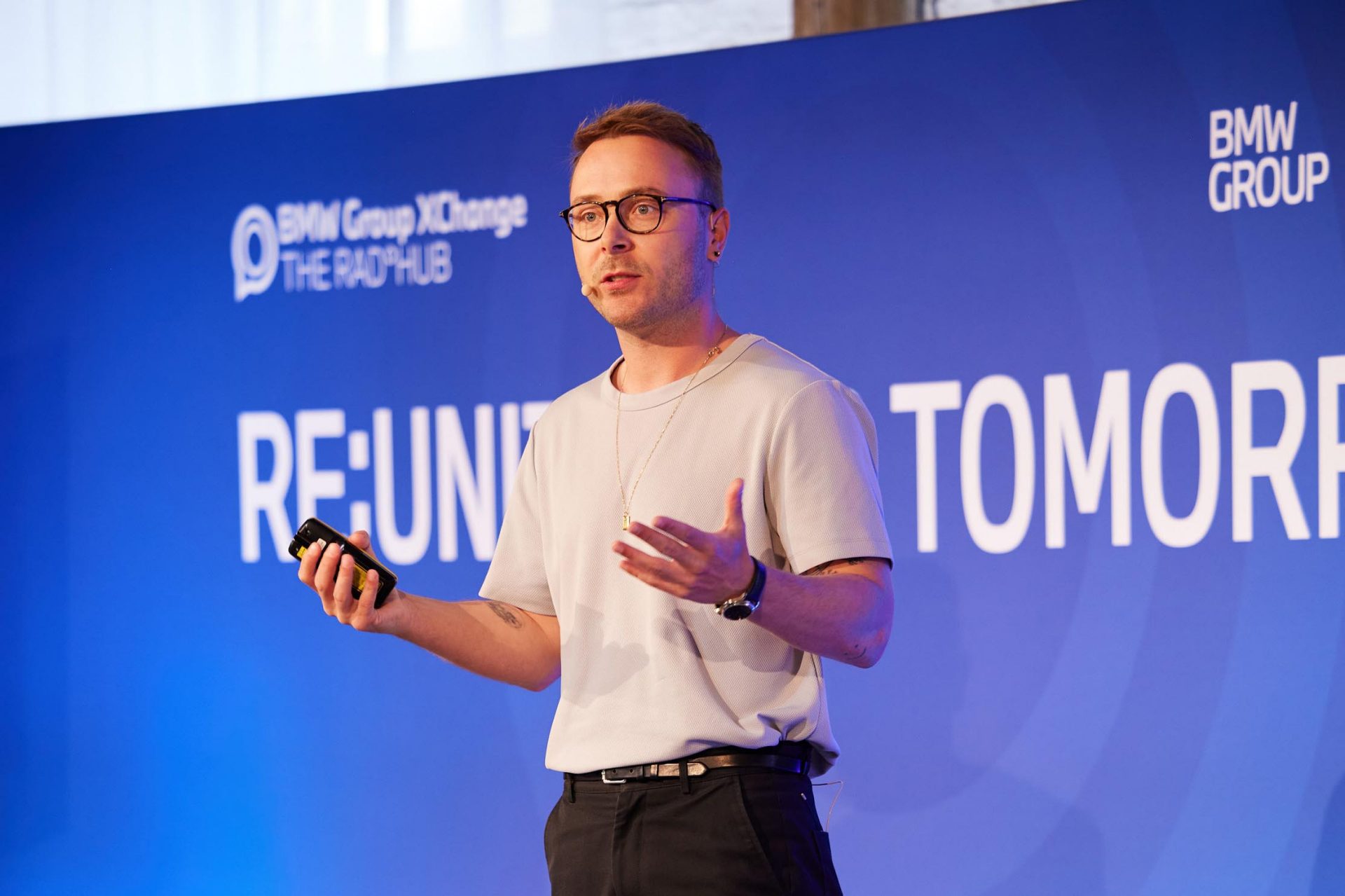  A portrait of a young man during his presentation on stage