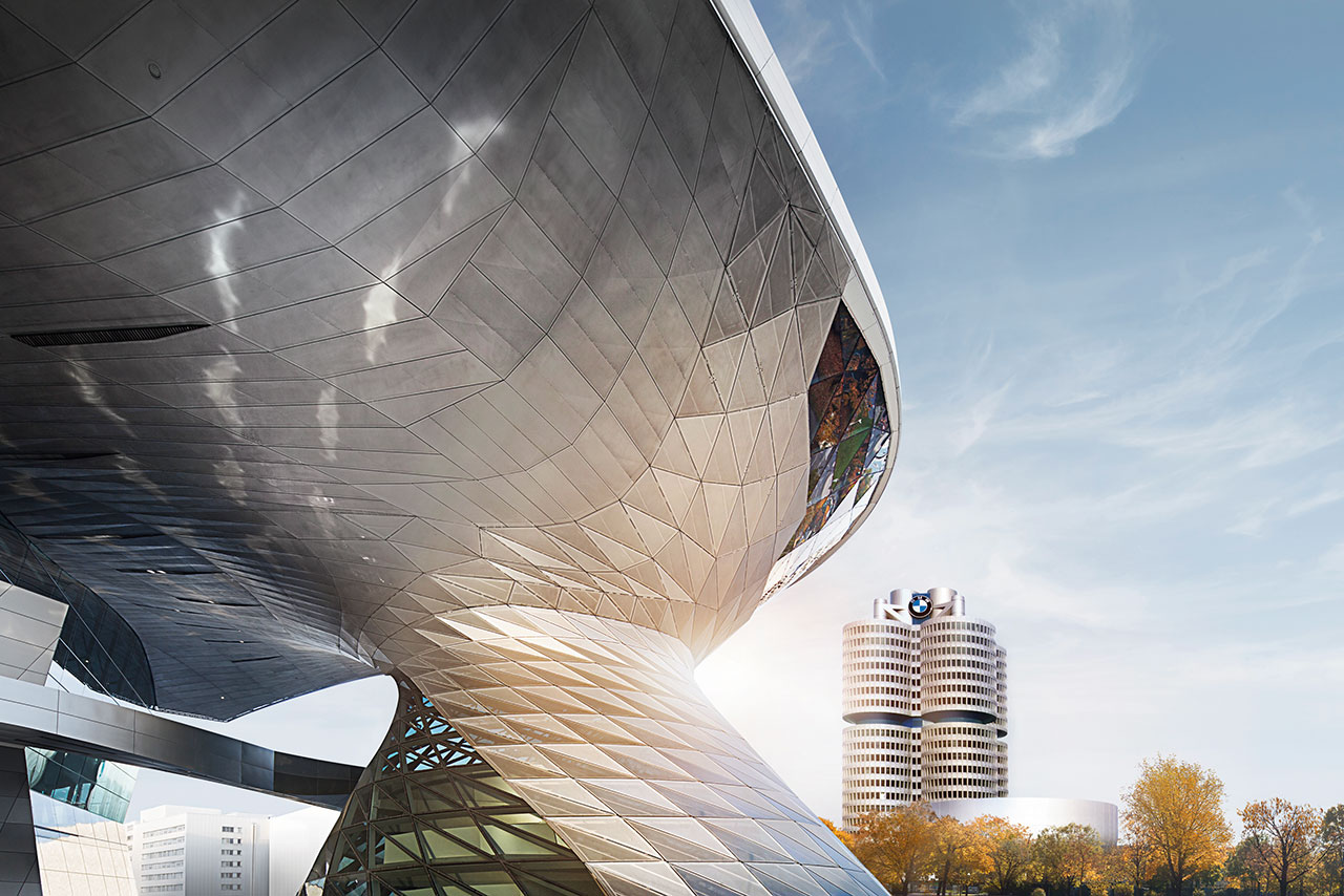 Sun shining through the BMW World and the BMW Four-cylinder.