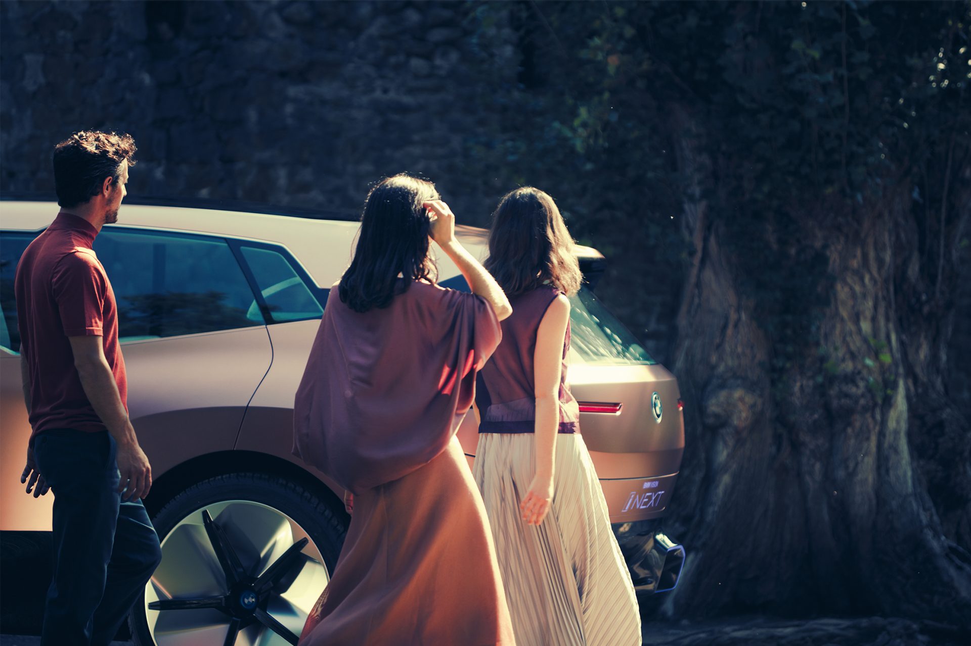People around a BMW Vision i Next in a park