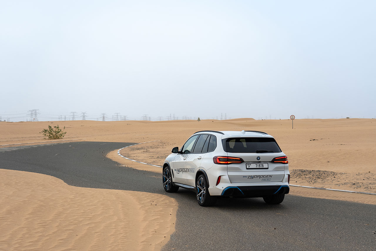 BMW Hydrogen Concept Car driving on a road through the desert.