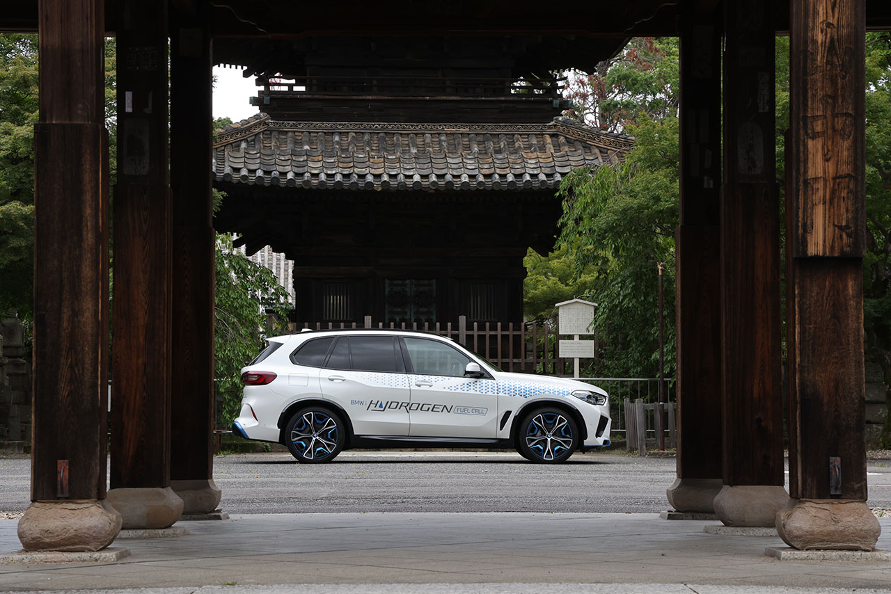BMW Hydrogen Car parked between asian temples.