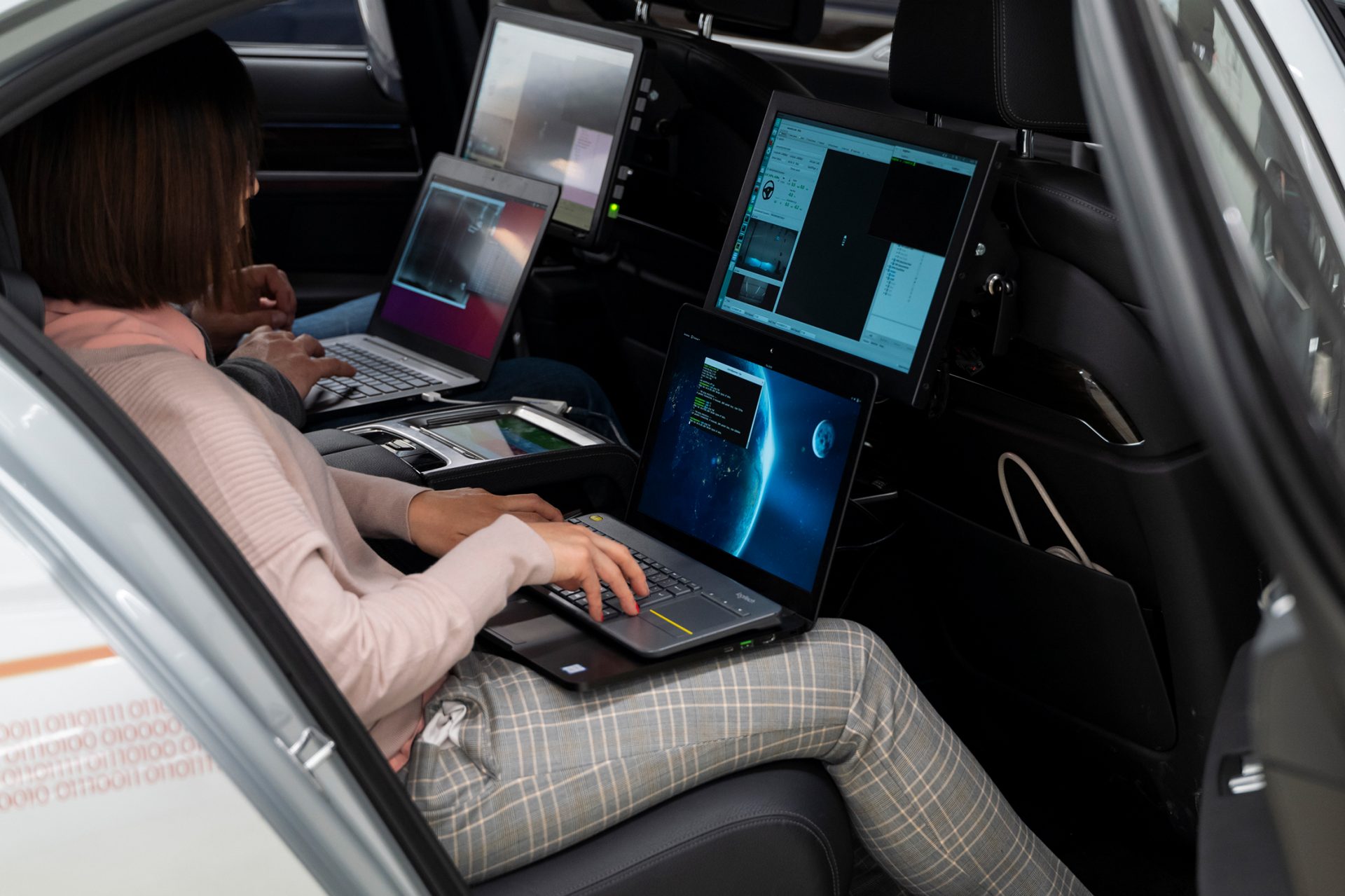 Working in the rear of a car