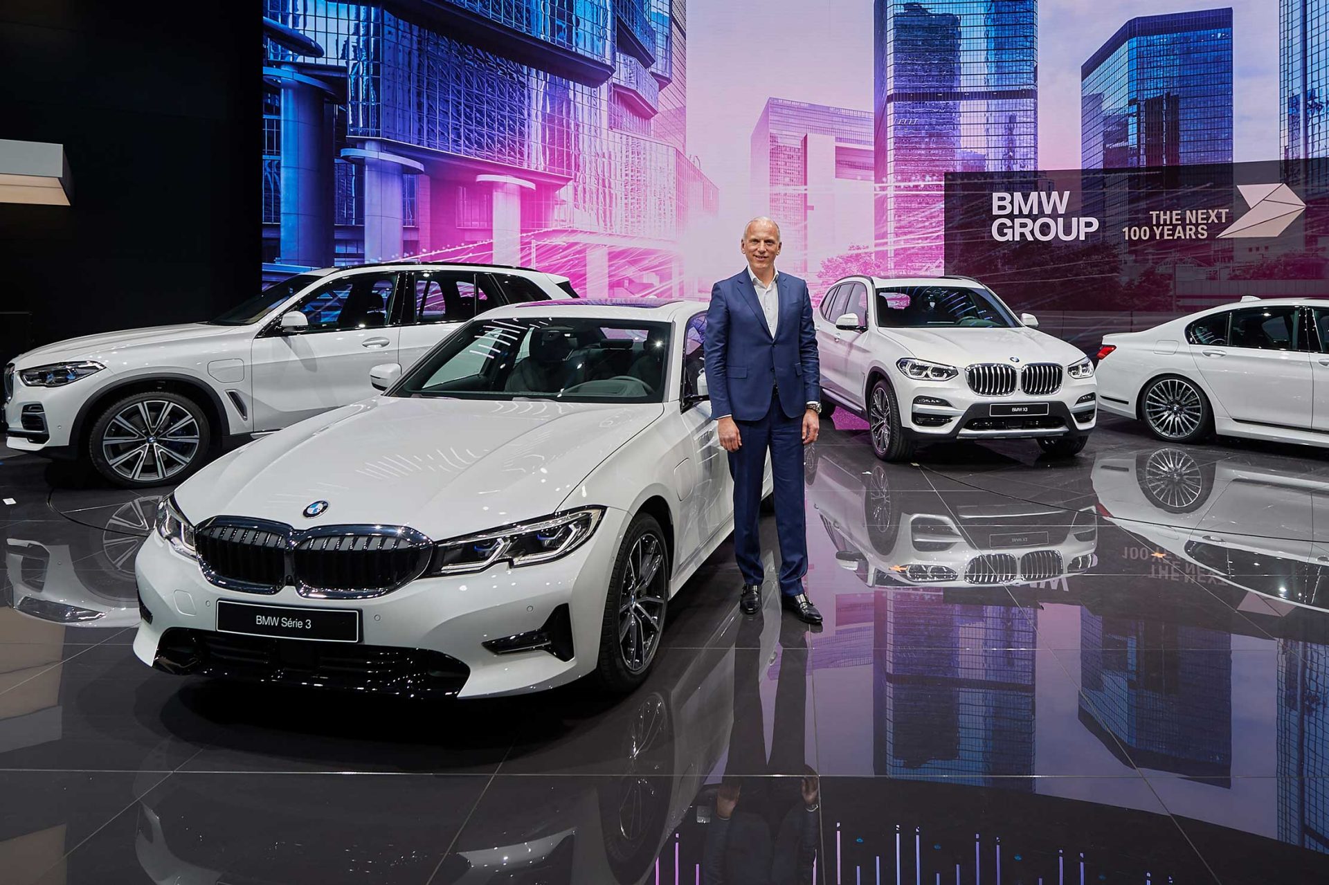 Pieter Nota with various BMW models