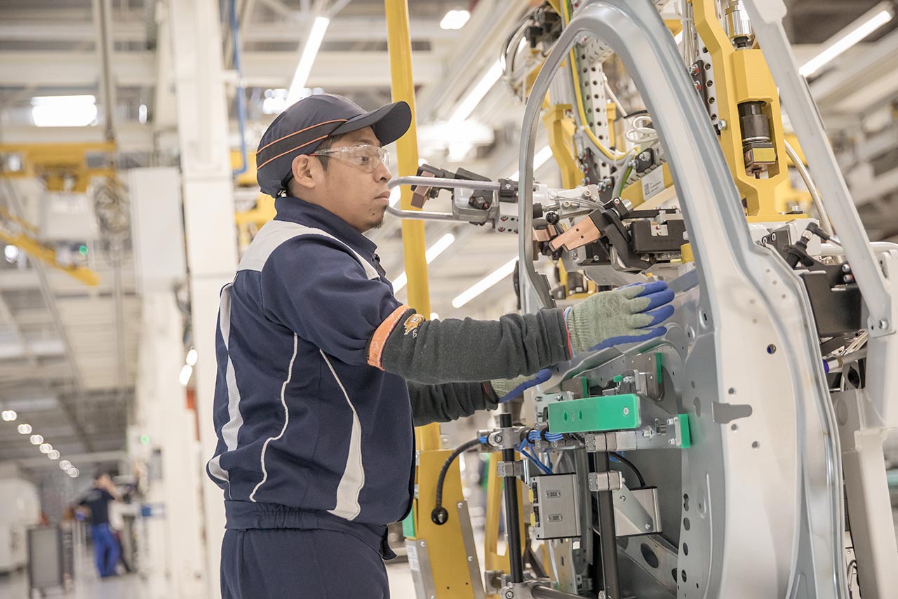 Factory worker during assembly
