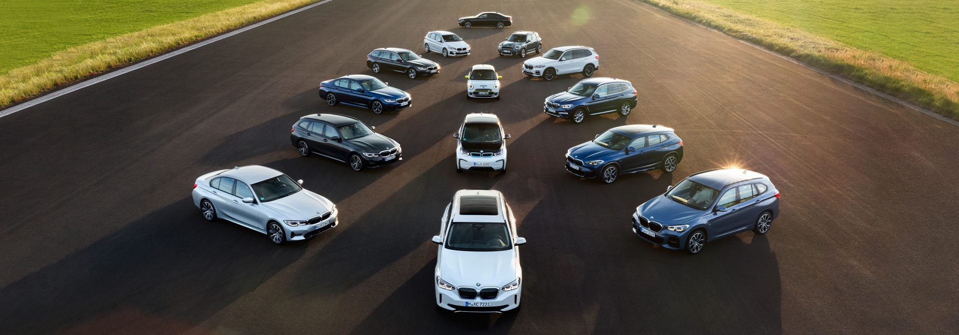 BMW i models on a road
