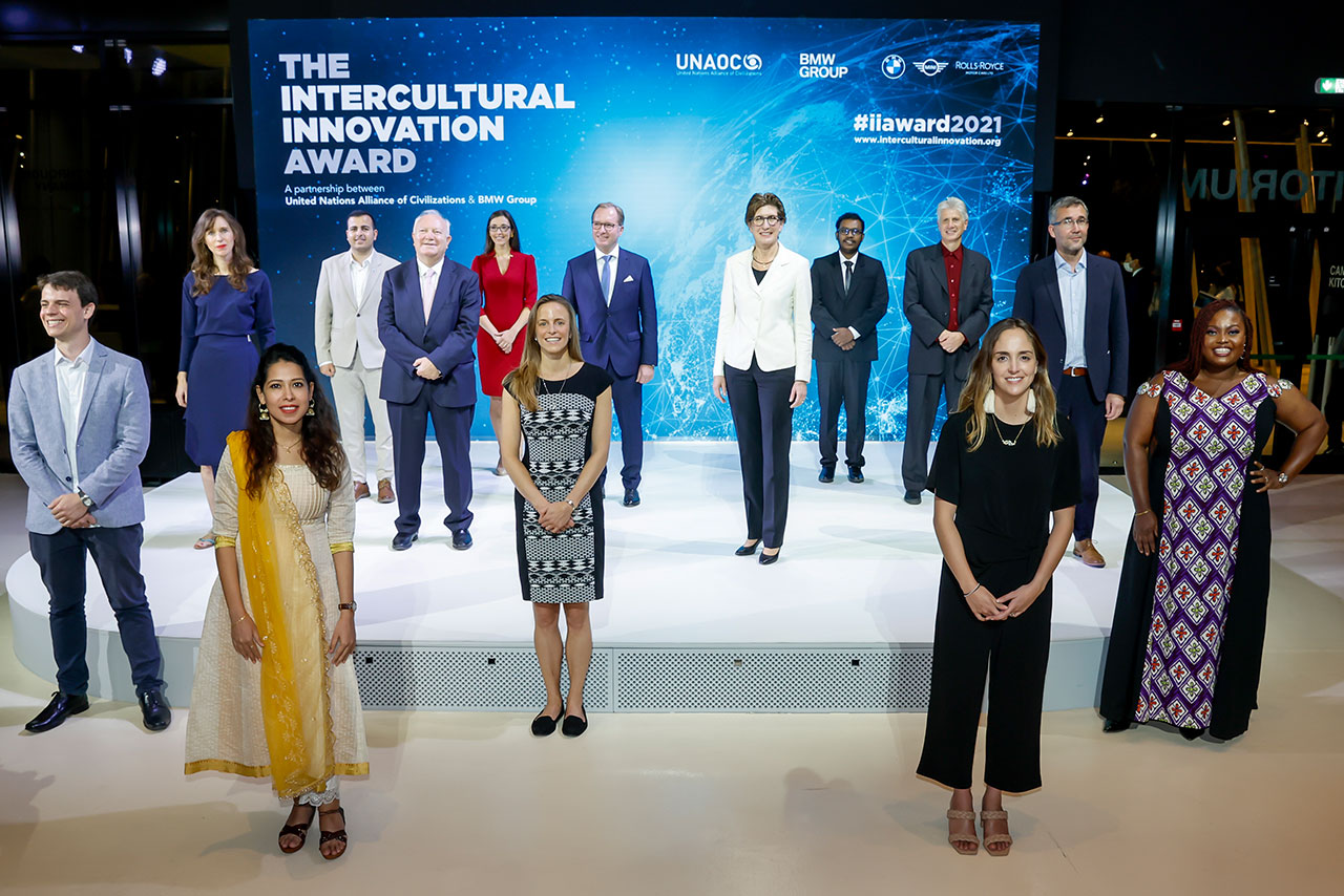People on stage at Intercultural Innovation Award