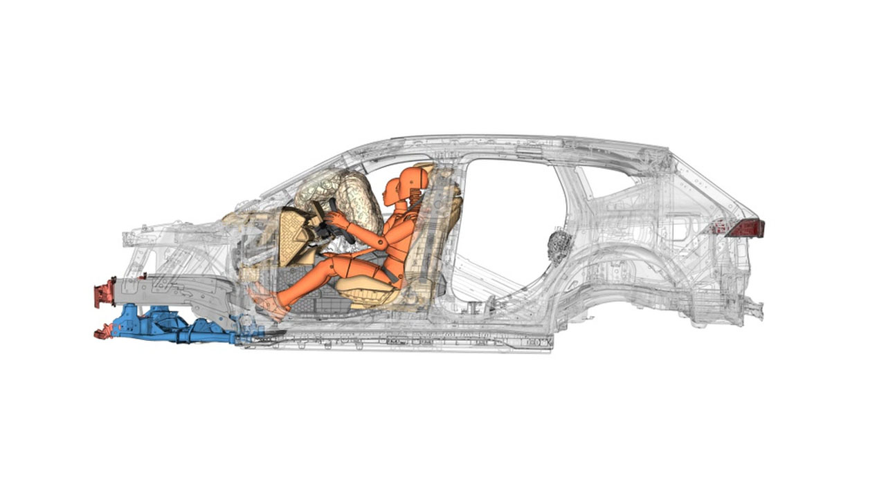 A crash simulation at the BMW Group: A virtual dummy in a digital vehicle shows how the airbags and safety belts deploy during a simulated impact.