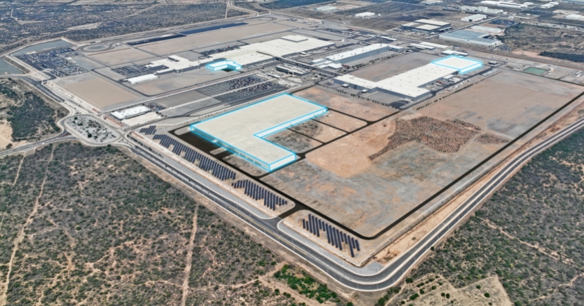 View of a factory site where three buildings are marked with a blue line.