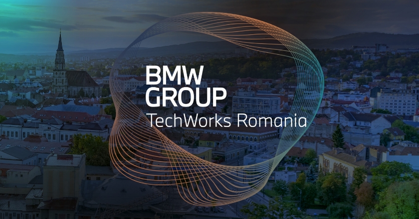 A logo consisting of several lines and the words “BMW GROUP TechWorks Romania” is superimposed on a darkened motif of a city.