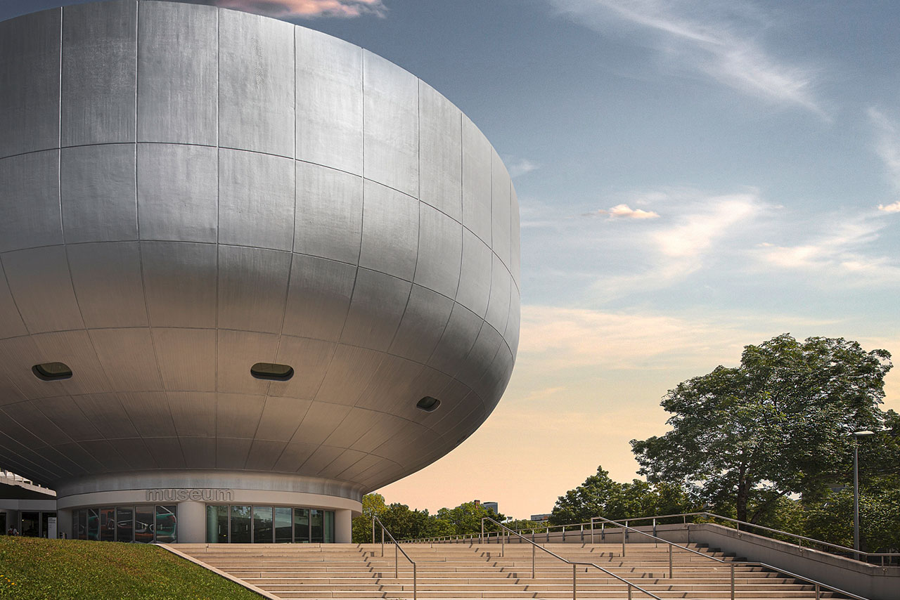 Exterior view of the BMW museum on a sunny day.