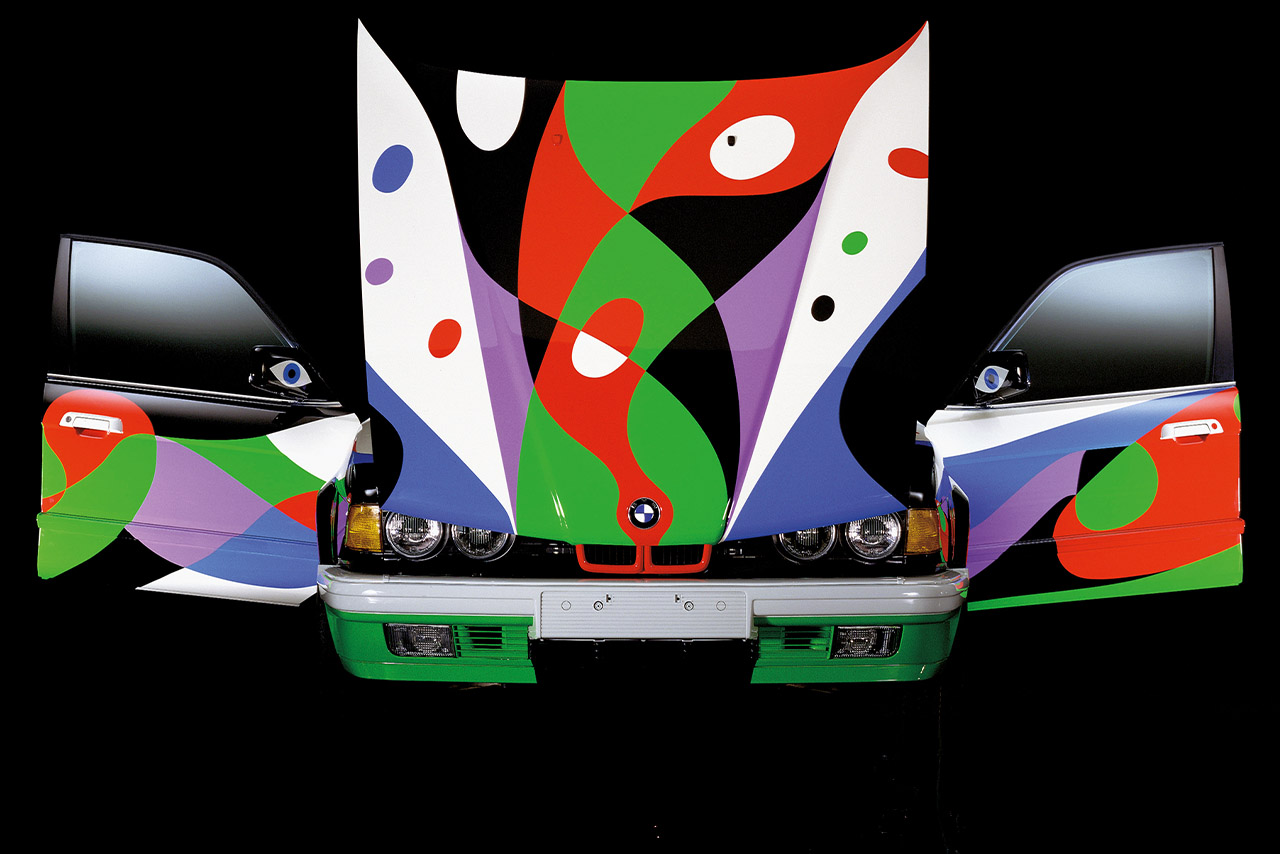 BMW 730i featuring a unique and colorful design on the hood.