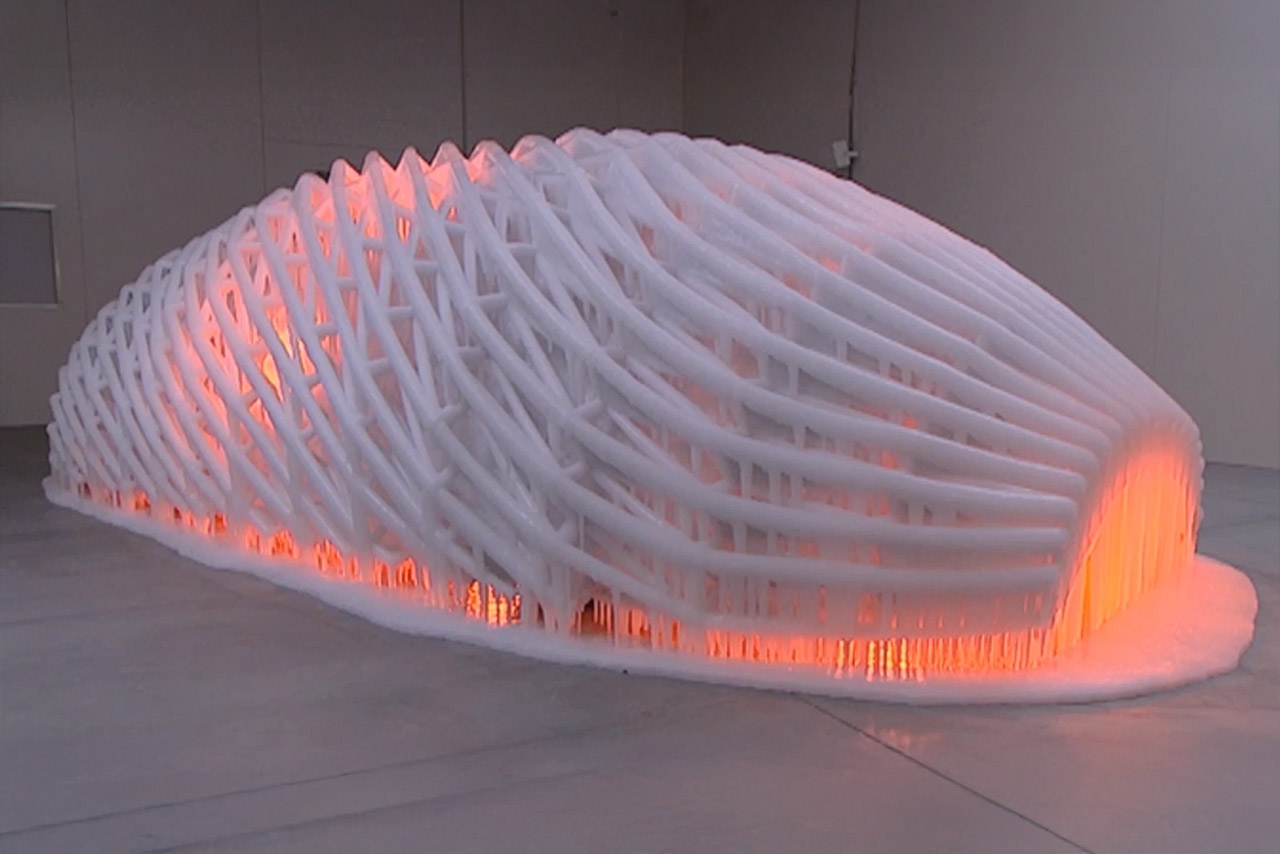 Artistic ice sculpture with illuminated base